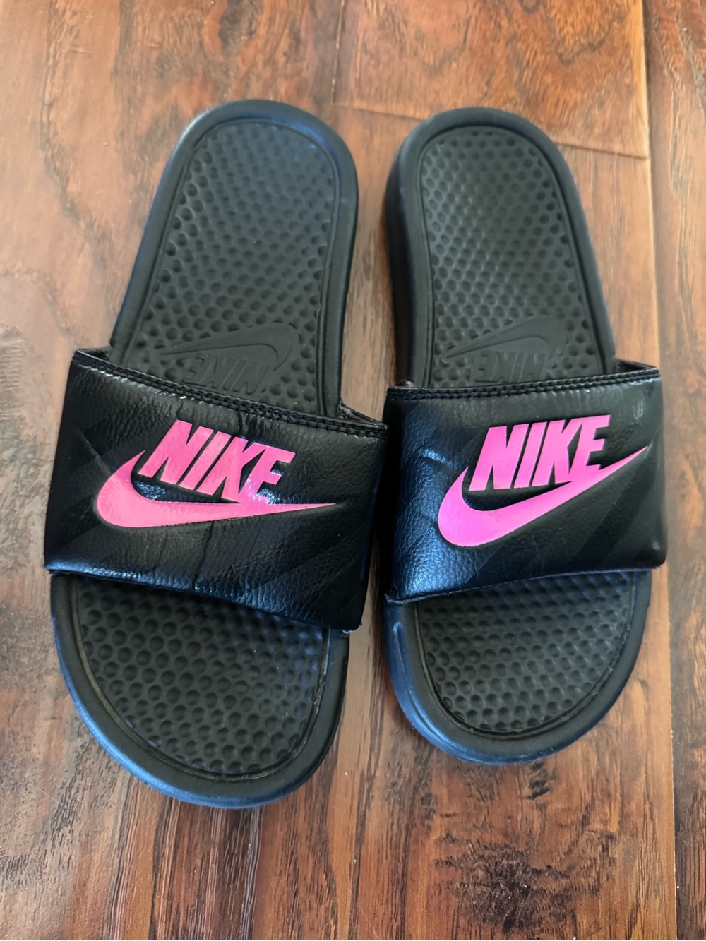Nike Black Slides with Pink Swoosh